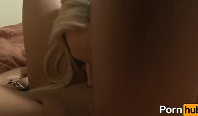 Blonde & brunette eating shaved pussies and using a dildo