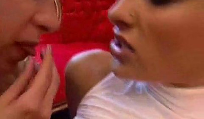 Playful lesbians love using a huge strapon to fuck their wet pussies into orgasms