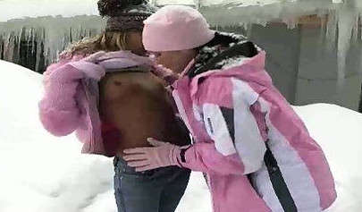 Playful lesbos get turned on for each other and fuck to orgasm in the snow outside