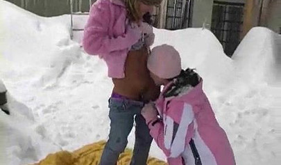 Playful lesbos get turned on for each other and fuck to orgasm in the snow outside