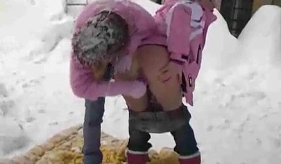 Playful lesbos get turned on for each other and fuck to orgasm in the snow outside