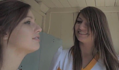 Hot and young lesbian brunette cheerleaders eat each other out to intense orgasms