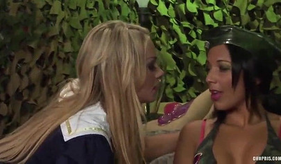Military lesbian sex with a double-sided dildo in two pussies