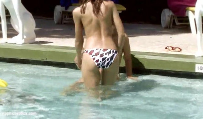 Wet lesbian fun with horny girls in the pool