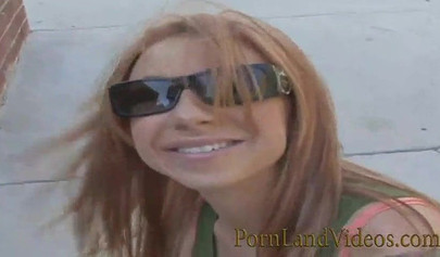 Redhead lesbian satisfies her cute girlfriend on the couch