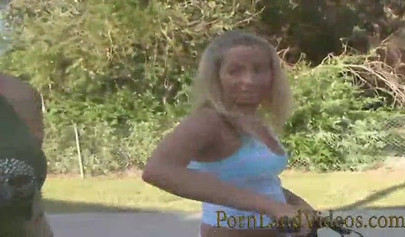 Redhead lesbian satisfies her cute girlfriend on the couch