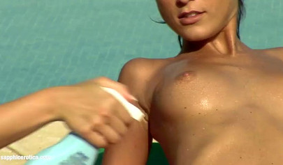 Liz and Jackie prefer oily lesbian sex by the pool