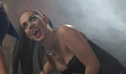 Lesbian vampiress cosplay in dark rooms