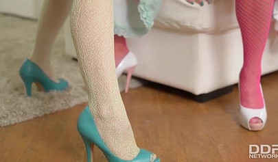 Cosplay lesbians in pantyhose enjoy foot fetish