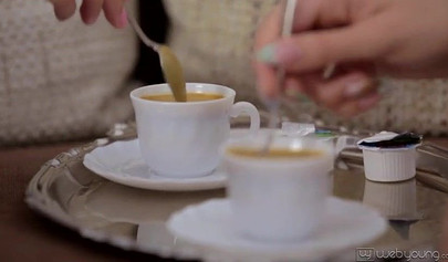 Sensual lesbian scene with pretty babes on the sofa