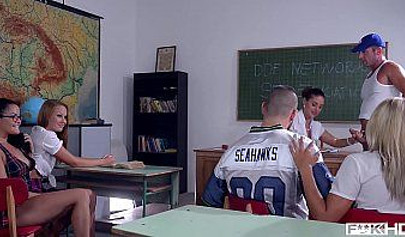 Horny schoolgirls take part in orgy with football players