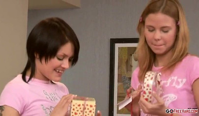 Cute girls celebrate St. Valentine's Day with sex toys