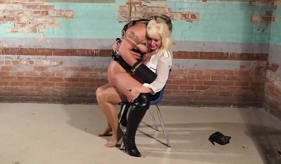 Tied up blonde slave gets punished by her mistress