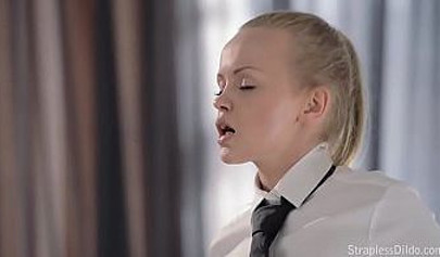 Hot blonde fucks her dark-haired girlfriend with a strap-on