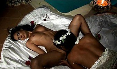 Attractive lesbians enjoying romantic sex in a dark room