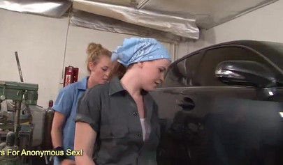 Passionate chicks lick wet pussies in a car repair shop