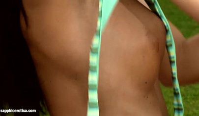 Sensual cuties lick juicy holes and enjoy fisting on the lawn