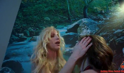 The Mommy Christmas Claus has fun with her slave