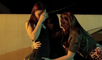 Hot chicks get horny in a car park and lick each other's pussy