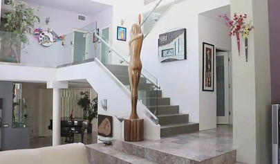 Cute teens in bikinis are having fun by the pool