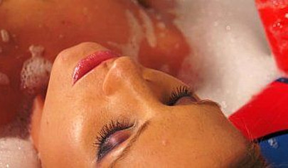 Busty lesbians are playing with each other in the pool