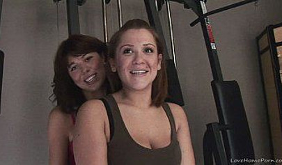 Homemade lesbian sluts playing with a strap-on in the gym