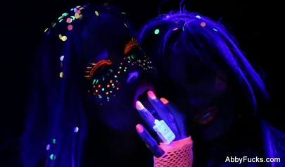 Abigail Mac takes part in a neon lesbian sex scene
