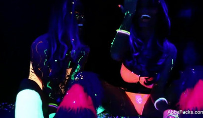 Abigail Mac takes part in a neon lesbian sex scene