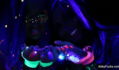 Abigail Mac takes part in a neon lesbian sex scene
