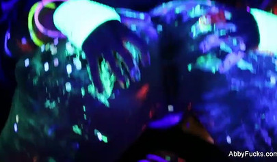 Abigail Mac takes part in a neon lesbian sex scene