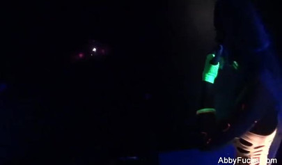 Abigail Mac takes part in a neon lesbian sex scene