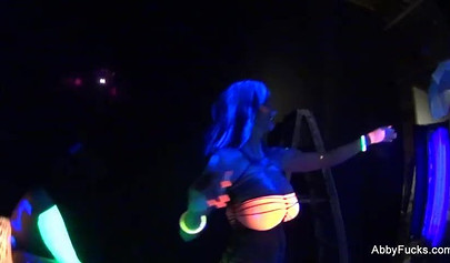 Abigail Mac takes part in a neon lesbian sex scene
