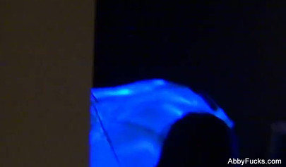 Abigail Mac takes part in a neon lesbian sex scene
