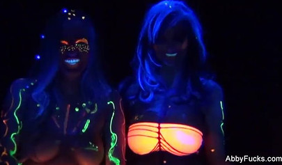 Abigail Mac takes part in a neon lesbian sex scene