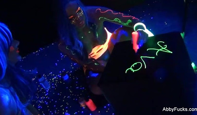 Abigail Mac takes part in a neon lesbian sex scene