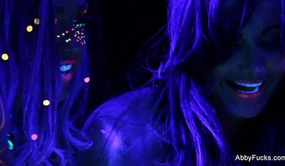 Abigail Mac takes part in a neon lesbian sex scene