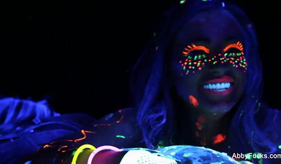 Abigail Mac takes part in a neon lesbian sex scene