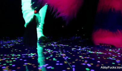 Abigail Mac takes part in a neon lesbian sex scene