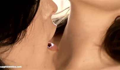 Attractive brunettes strip down naked and taste each other's twats