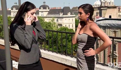 Lesbians Frida Sante & Rebecca Volpetti fuck each other's asses with a double-sided toy