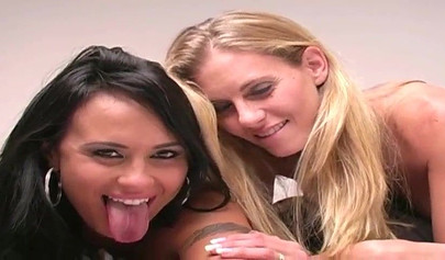 Hot lesbians in heels fuck on the camera