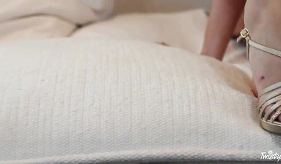 Big titted lesbians Emily Addison and Sabrina Maree play with each other's muffs in a 69
