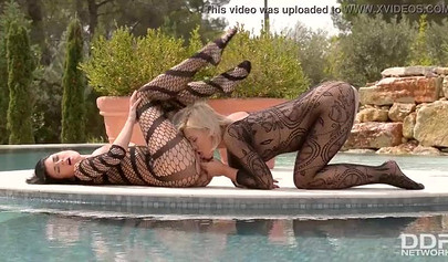 Sexy mermaids in hot bodystockings Tracy Lindsay & Lucy Li engage in hot lesbian anal foot play