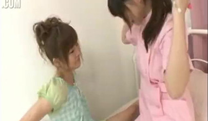 Japanese nurse strips a young babe and gives her hot oral pleasure