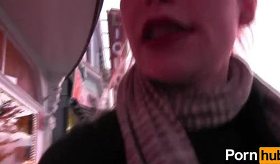 Amateur lesbians enjoying a strap-on sex in the kitchen