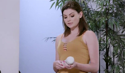 Busty beauties play with a giant white vibrator in the bedroom