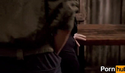 A prisoner fucks a redhead police officer with a strap-on