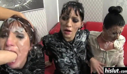 Hot lesbian strap-on orgy with beauties in latex and fake cum