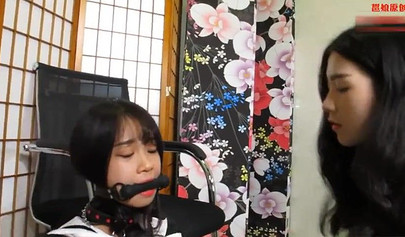 Chinese bondage and a gag in the mouth for a submissive slave