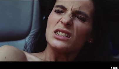 Voluptuous babes satisfy each other passionately in a car